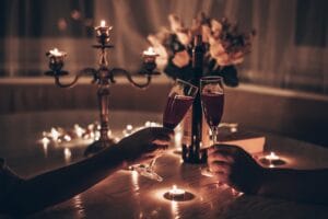 Hands,Man,And,Woman,Holding,Glasses,Of,Wine,Having,Romantic